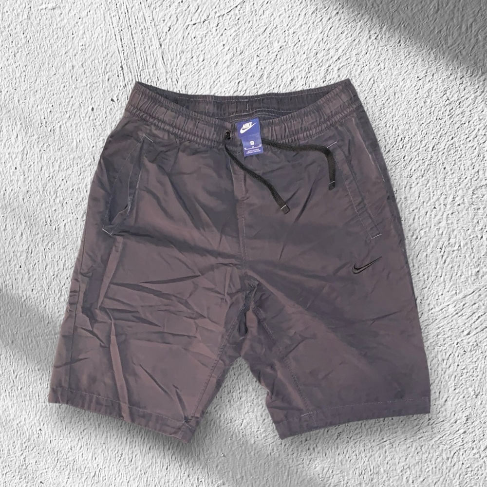Nike brand, black shorts, size M